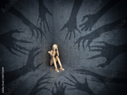 The concept of various phobias and depression. The shadows of the hands pursue a wooden puppet. 3d illustration photo