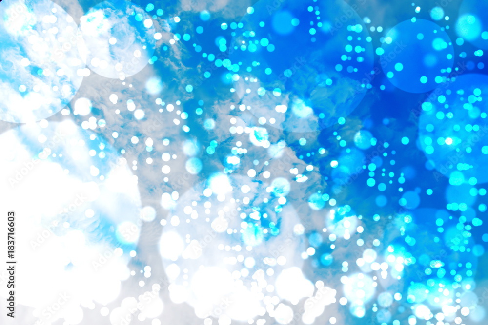 Bokeh blurred with snow and blue sky background Bokeh blurred with snow and blue sky background