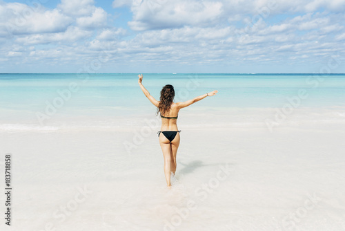 Young woman relax on the beach.