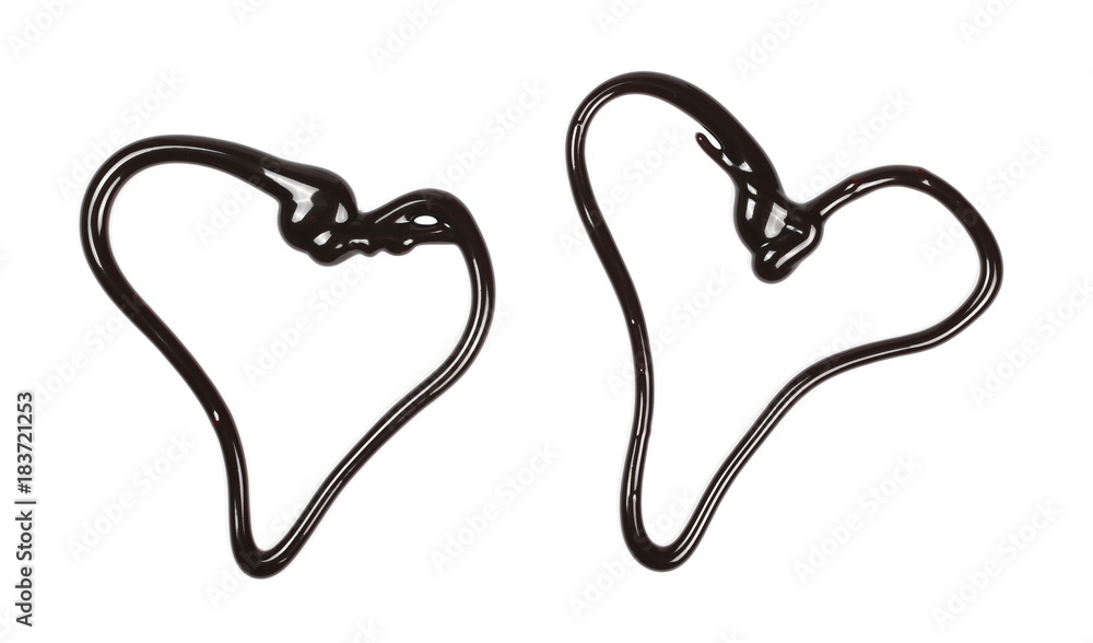 Hot melted chocolate pouring in heart shape isolated on white background, top view Hot melted chocolate pouring in heart shape isolated on white background, top view