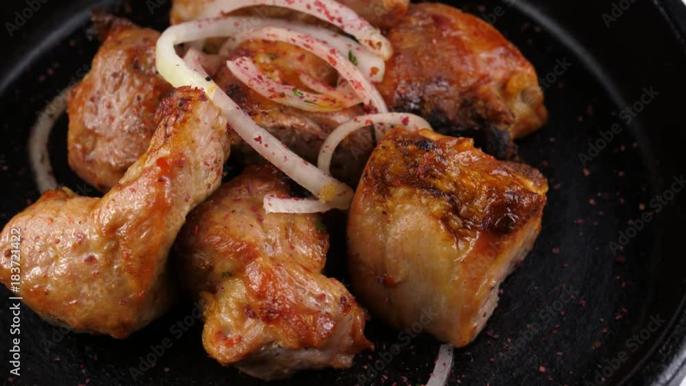 Pork skewers or Shish kebab, cooked, served in black clay dish, loop, ProRes codec, 422 HQ Pork skewers or Shish kebab, cooked, served in black clay dish, loop, ProRes codec, 422 HQ
