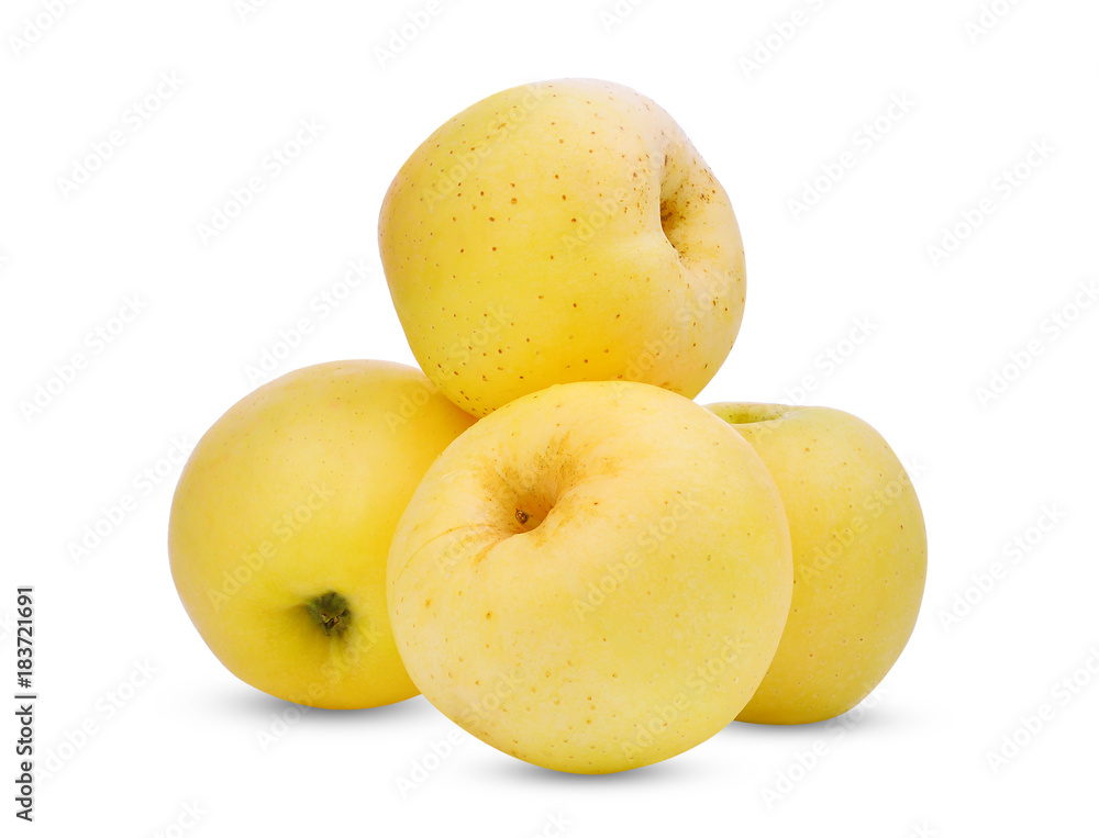 stack of golden or yellow apple fruit isolated on white background