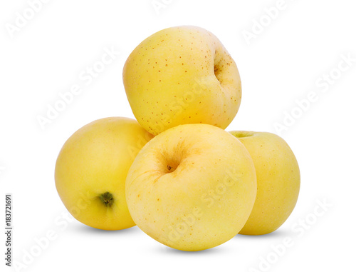 stack of golden or yellow apple fruit isolated on white background