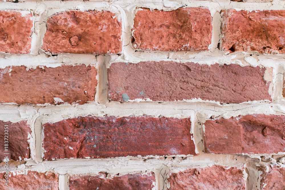 Obraz premium texture of a rough plastered brick wall