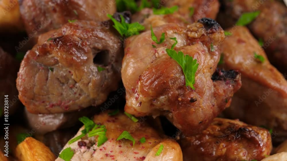 Platter of broiled meat on the grill or meat kebabs, close-up view, loop, ProRes codec, 422 HQ Platter of broiled meat on the grill or meat kebabs, close-up view, loop, ProRes codec, 422 HQ