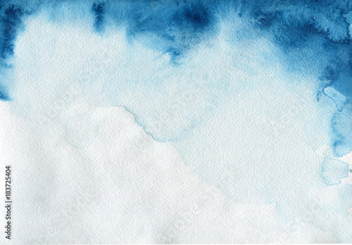 Watercolor blue color shape. Indigo paper texture. Abstract background with splash wet brush. photo