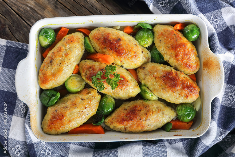 close-up of delicious roasted in oven fish cutlets close-up of delicious roasted in oven fish cutlets