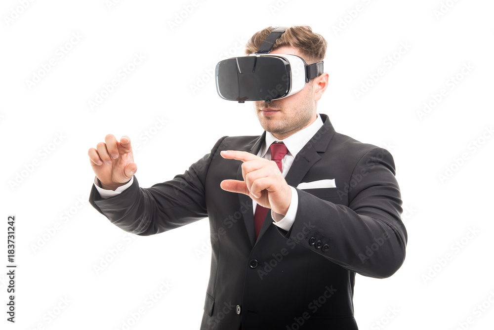 Manager wearing vr goggles catching something Manager wearing vr goggles catching something