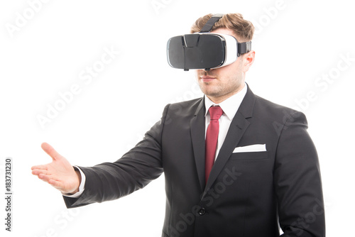Manager wearing vr goggles offering hand shake