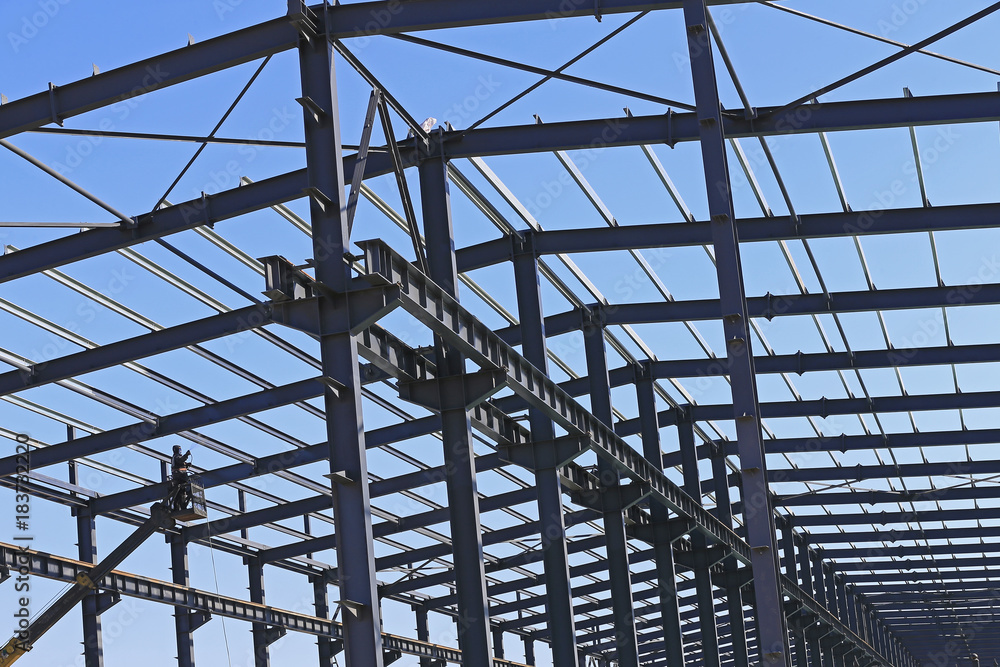 Fototapeta premium The steel frame structure is under construction