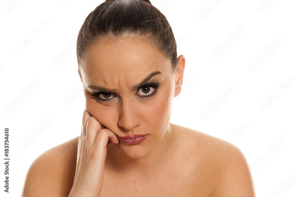 beautiful young angry woman posing on white background beautiful young angry woman posing on white background