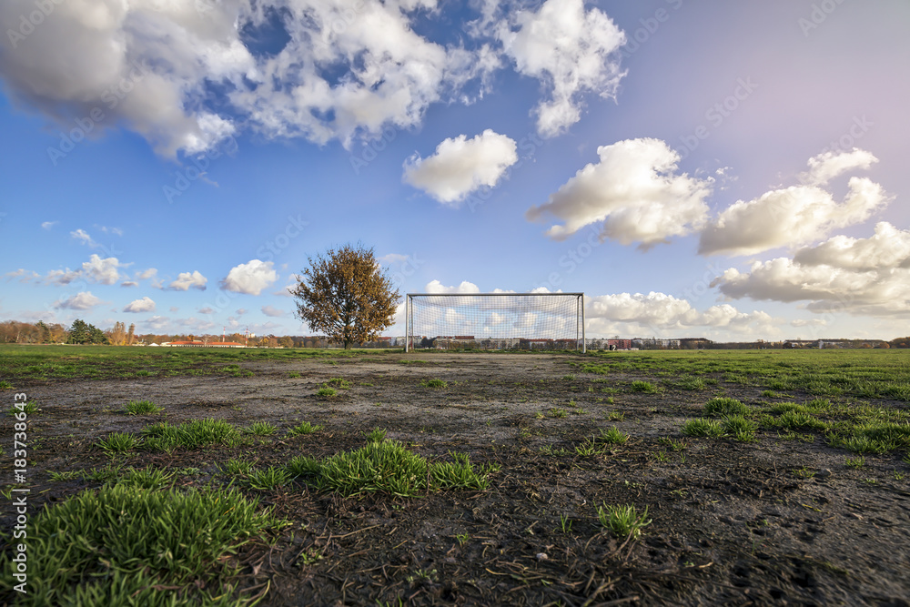 soccer goal with tree, skyline and cloudscape soccer goal with tree, skyline and cloudscape
