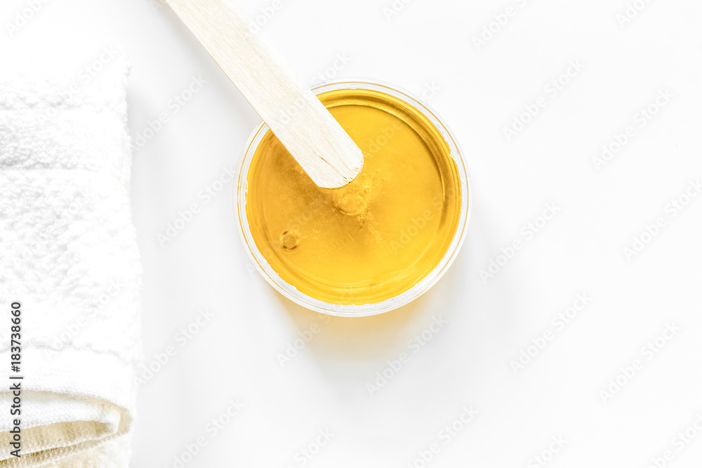 concept depilation with wax on white background top view concept depilation with wax on white background top view