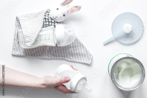 preparation of mixture baby feeding on white background top view
