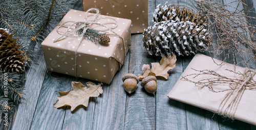 Christmas background with gift box on wooden planks