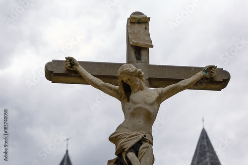 Jesus Christ crucified stone sculpure in Antwerp in Belgium