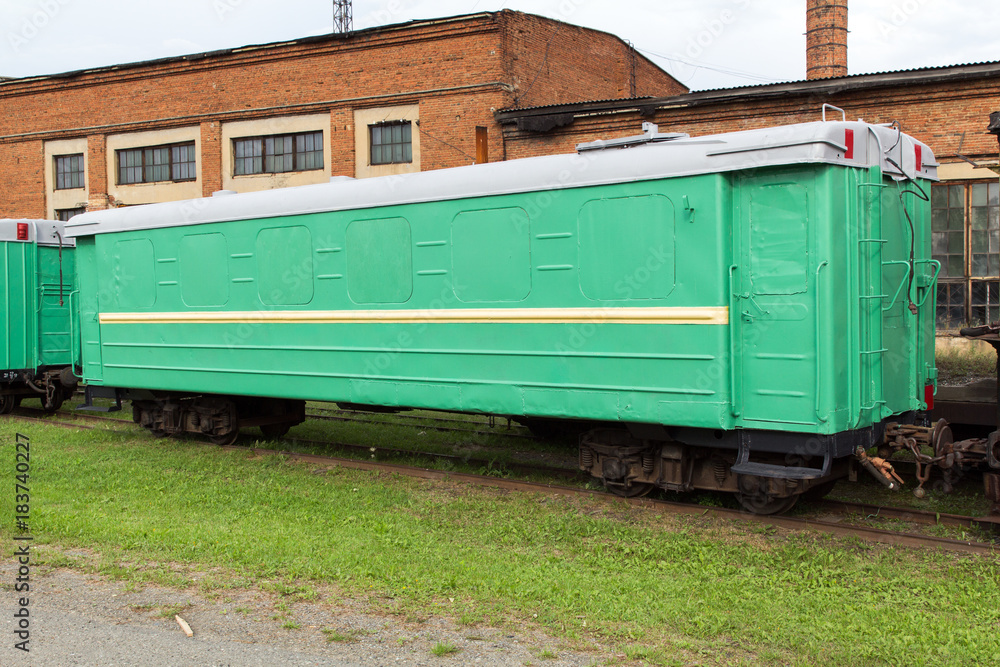 Green narrow-gauge railway wagon Green narrow-gauge railway wagon