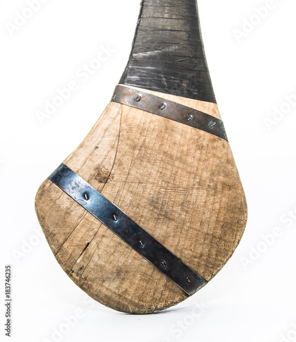 Gritty broken Irish hurl, isolated on white background photo