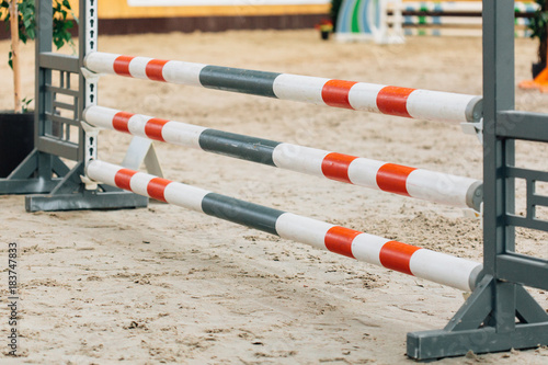 Show jumping barriers on the ground. Arena for equestrian sports