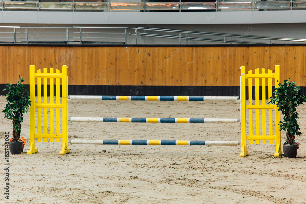 Show jumping barriers on the ground. Arena for equestrian sports