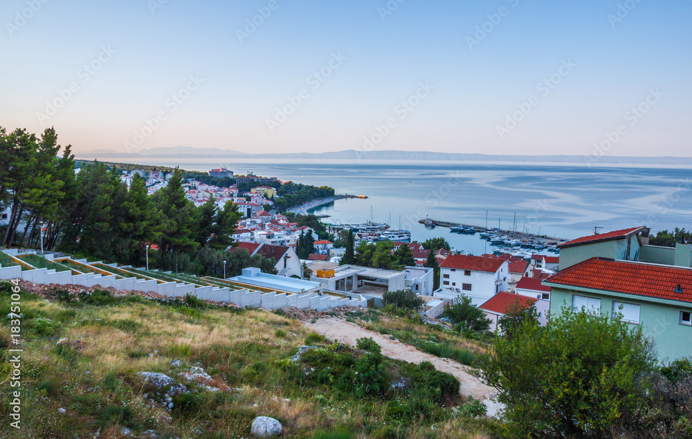 Aerial view on Adriatic Sea and Baska Voda place in Makarska Riviera, Dalmatia region, Croatia.
