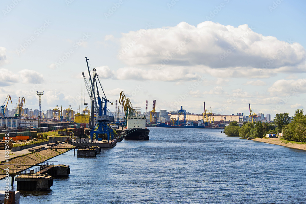 Saint-Petersburg sea port with vessel moored
