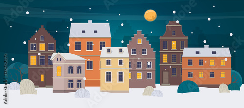 Winter city landscape. Old town with different houses at night