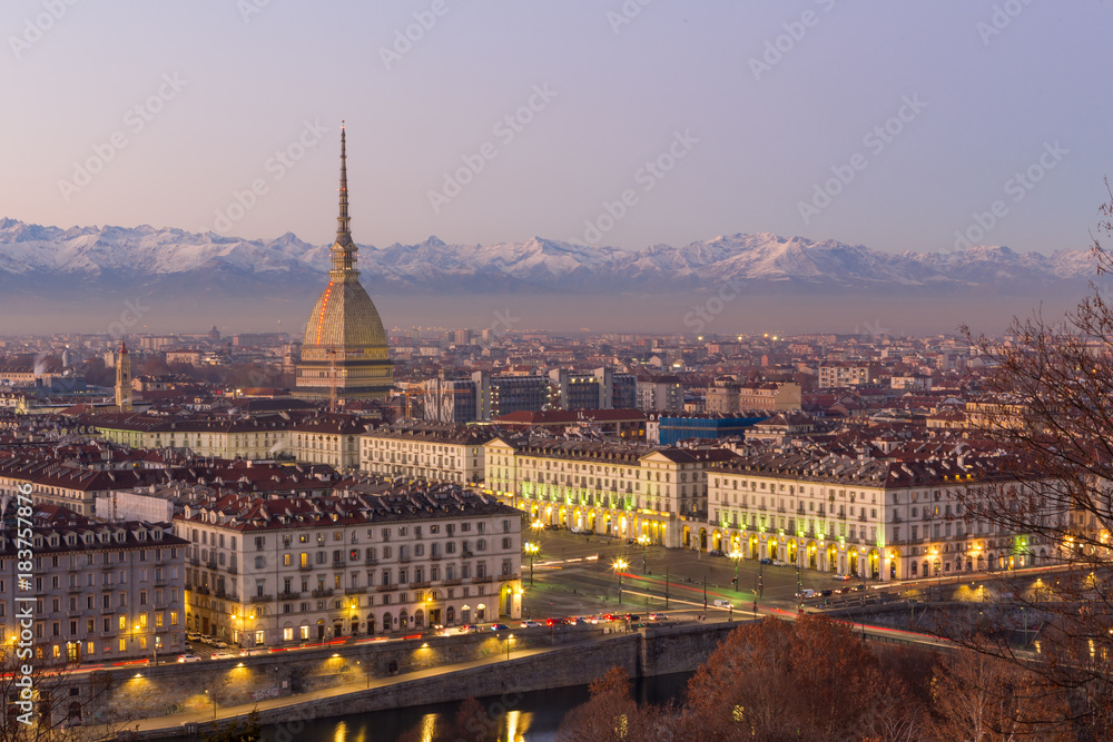 Turin, Italy: cityscape at sunrise with details of the Mole Antonelliana