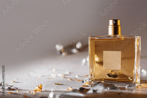 Fototapeta Female perfume in beautiful bottle