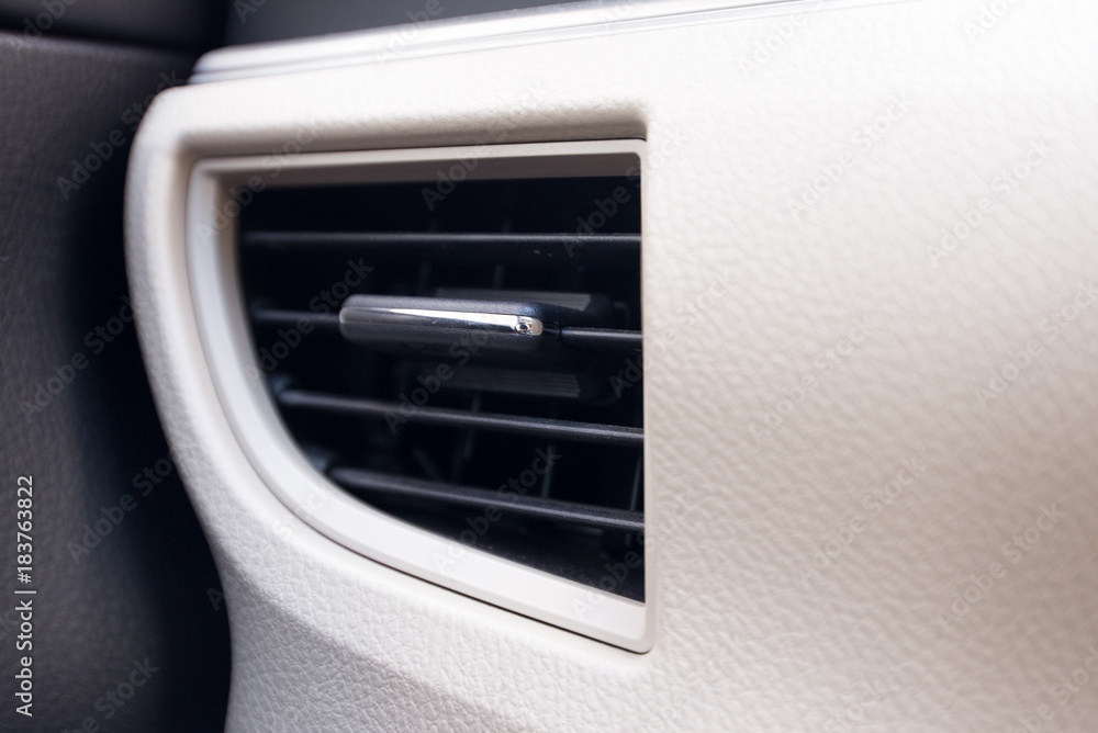 Cool air conditioning in car on console. Auto interior car detail. Cool air conditioning in car on console. Auto interior car detail.