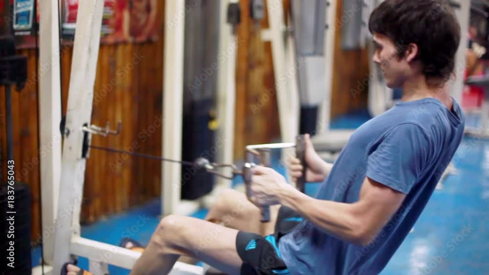 Athletic handsome young male does exercises at gym. 1920x1080, hd Athletic handsome young male does exercises at gym. 1920x1080, hd