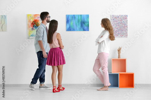 Group of people in art gallery