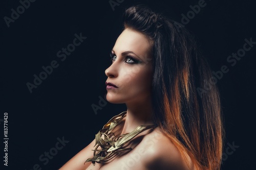 Portrait of a young girl in profile, looking up photo