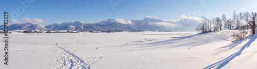 winter lake with mountains and snow