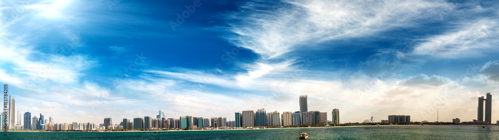 Abu Dhabi, UAE. Panoramic cityscape view at sunset from Marina viewpoint Abu Dhabi, UAE. Panoramic cityscape view at sunset from Marina viewpoint