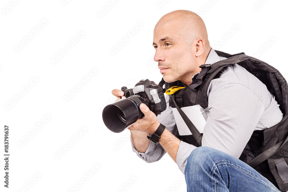 military press photographer with a professional camera. military press photographer with a professional camera.