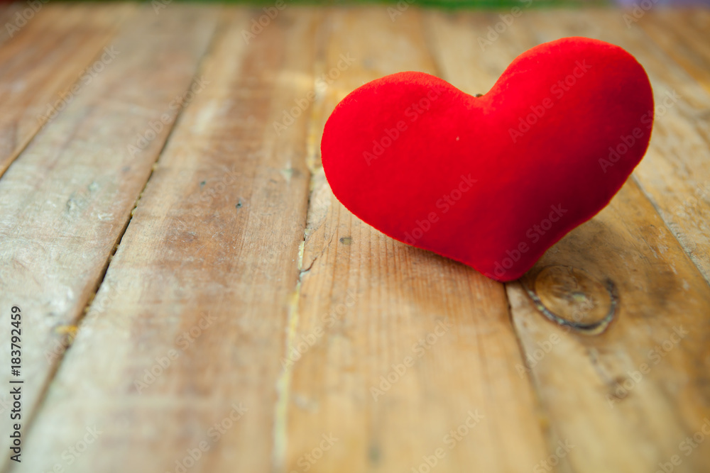 Red mini heart on wood background with space.. Red mini heart on wood background with space..