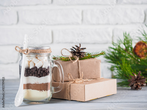 Hot chocolate mix in mason jar and gift boxes