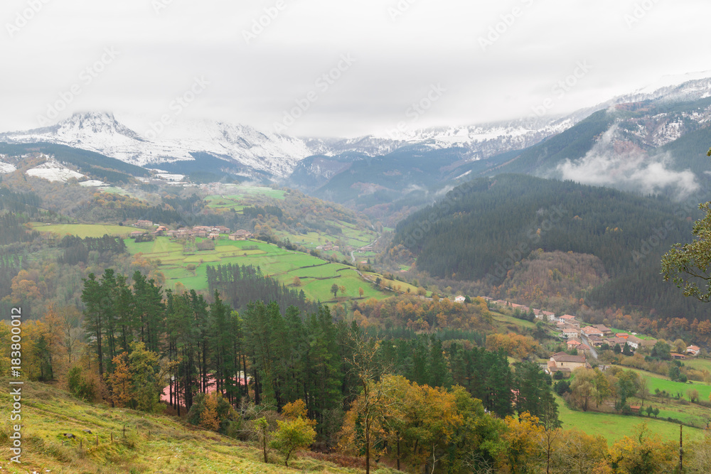 Rural village of the Basque Country in a cloudy and foggy day, Spain