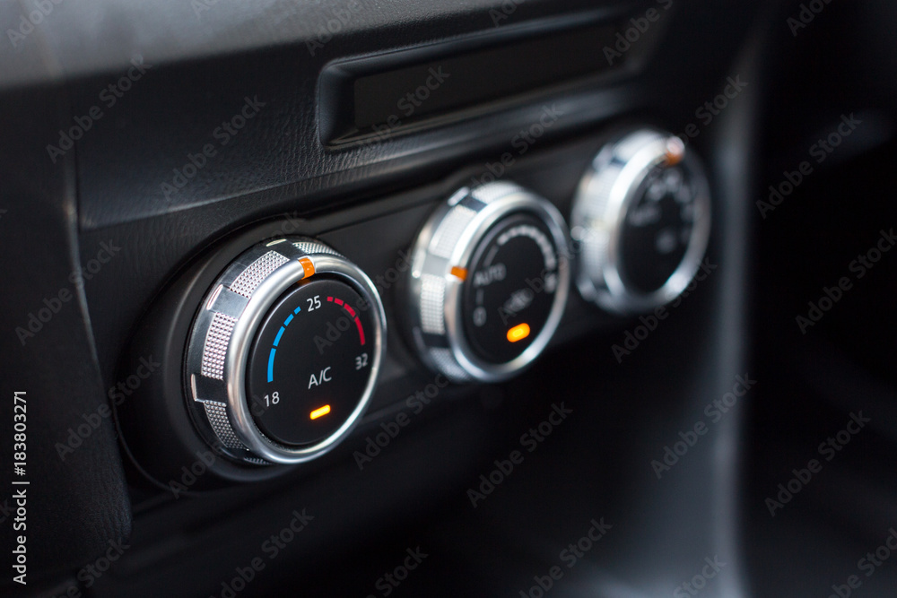 Car air conditioning control panel inside a car. Car interior Car air conditioning control panel inside a car. Car interior