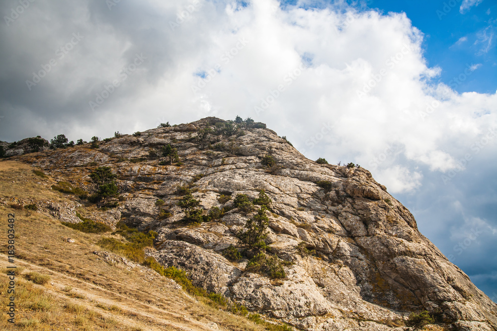 Mountain in a summer sunny day and clouds. Mountain in a summer sunny day and clouds.