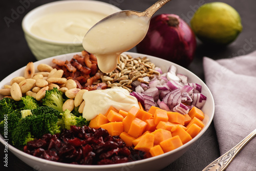 Wallpaper Mural Broccoli salad with yogurt dressing, cheese, bacon, almond and cranberries