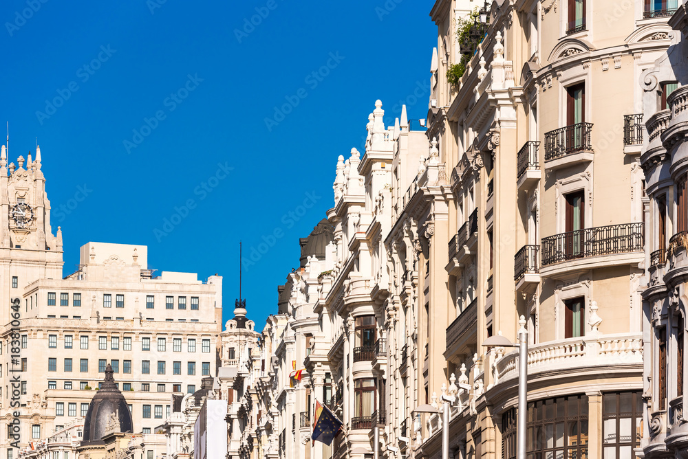 Beautiful historical building of old architecture in the city center, Madrid, Spain. Copy space for text