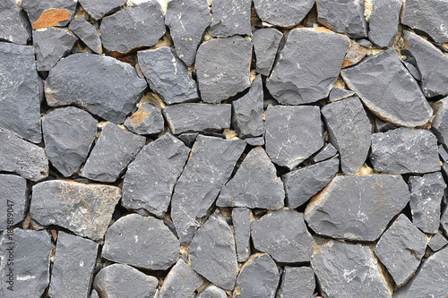 Stone wall background texture basalt rocks wall