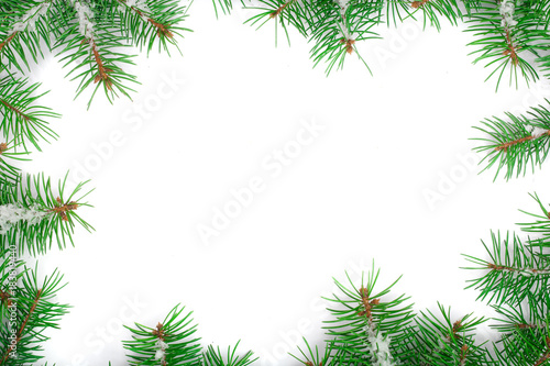 Frame of Fir tree branch with snow isolated on white background with copy space for your text. Top view