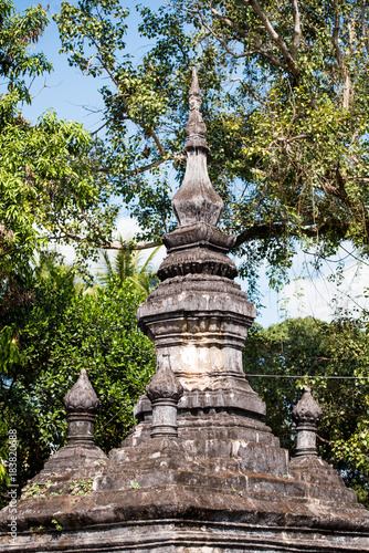 Pagoda in the temple Wat Sensoukaram in Louangphabang, Laos. Vertical.