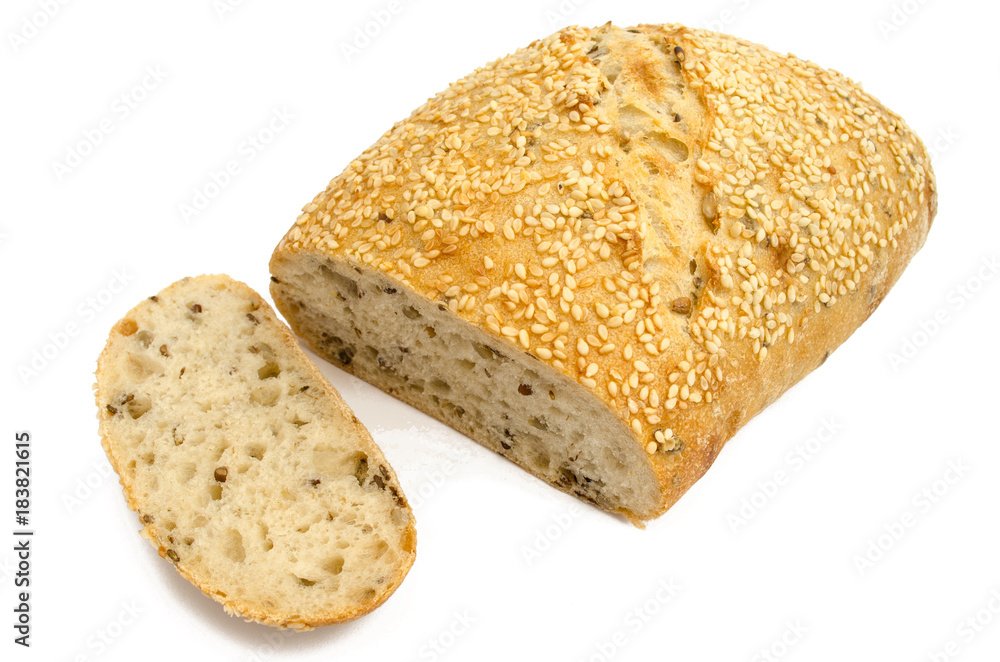 Sesame bread with different seeds and sliced isolated on white background Sesame bread with different seeds and sliced isolated on white background