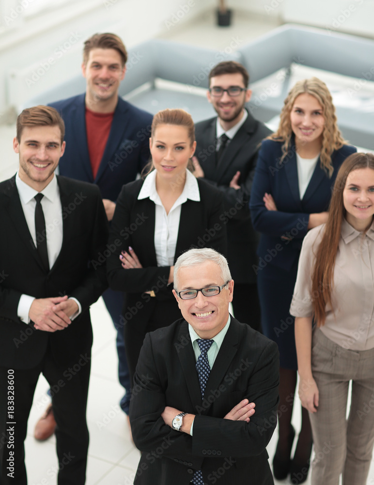 view from the top. group of smiling business people looking at camera. view from the top. group of smiling business people looking at camera.