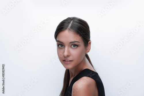 Portrait of a cute young woman. The concept of youth and skin care.