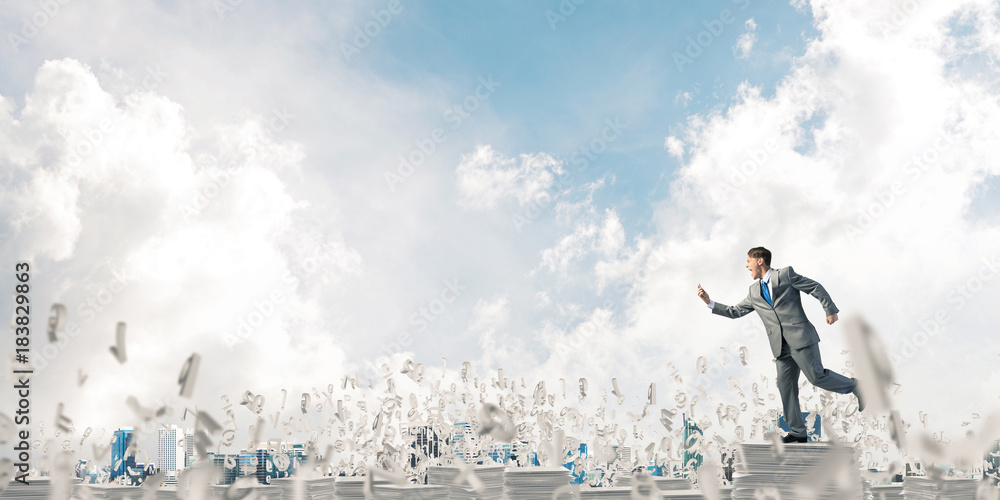 Precise businessman in suit running with phone. Precise businessman in suit running with phone.